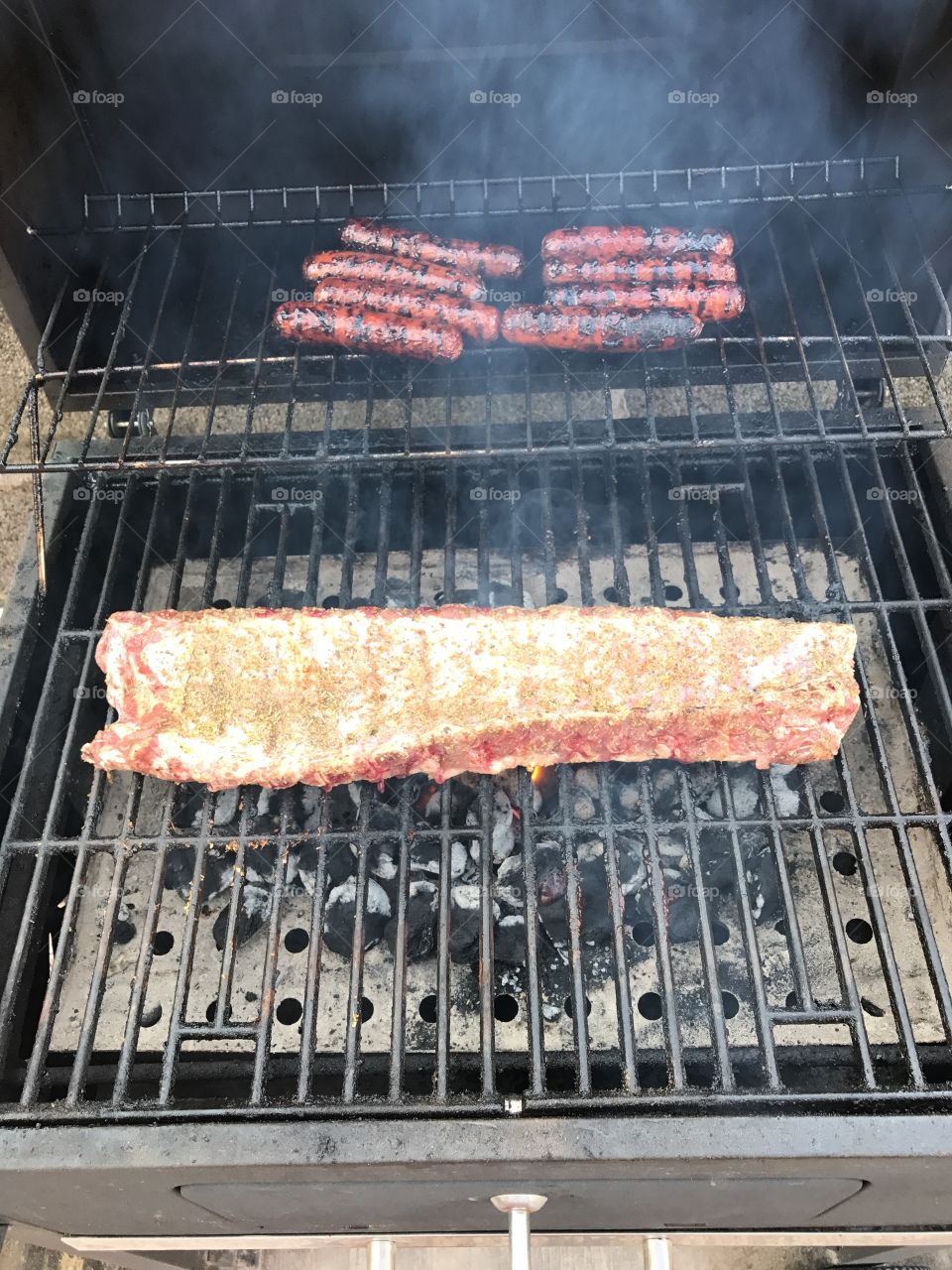 Sunday morning grilling of hot dogs and baby back ribs. 