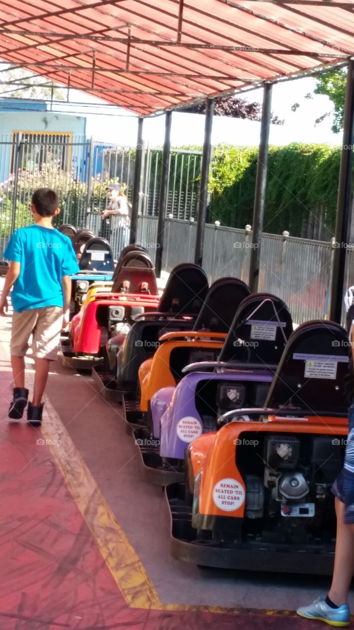 Colorful Go carts. Fun time for kids on go carting track