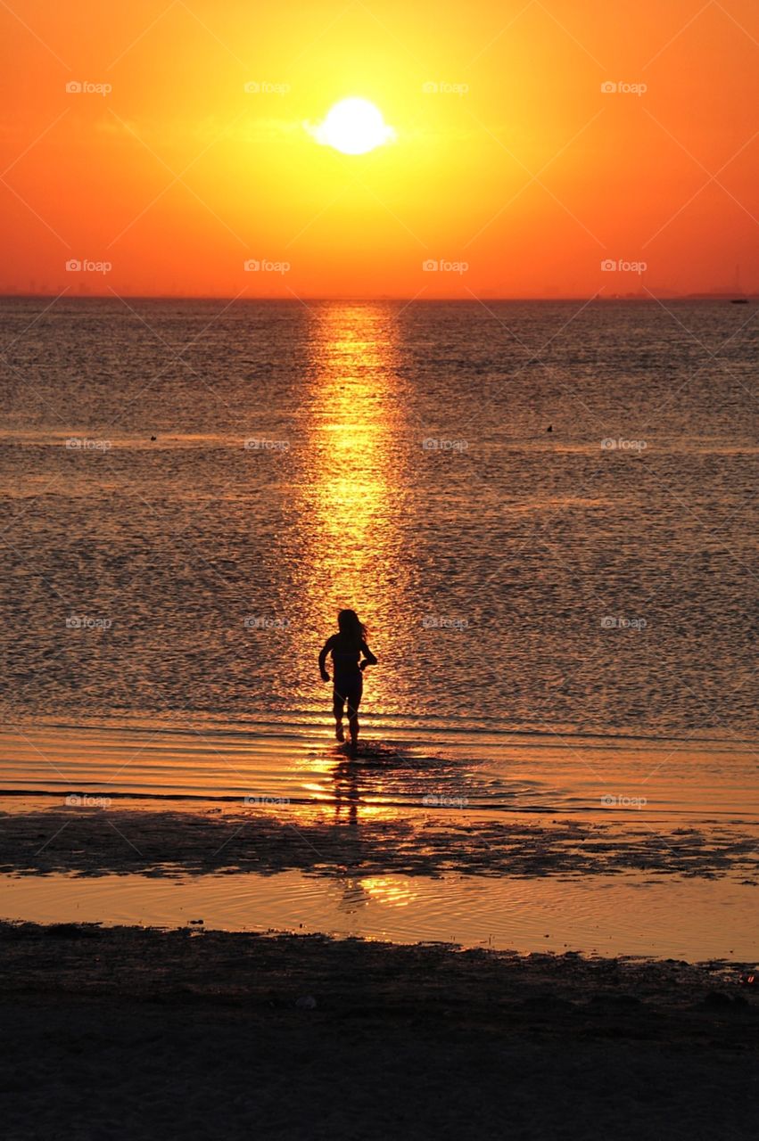 Splashing in sunset