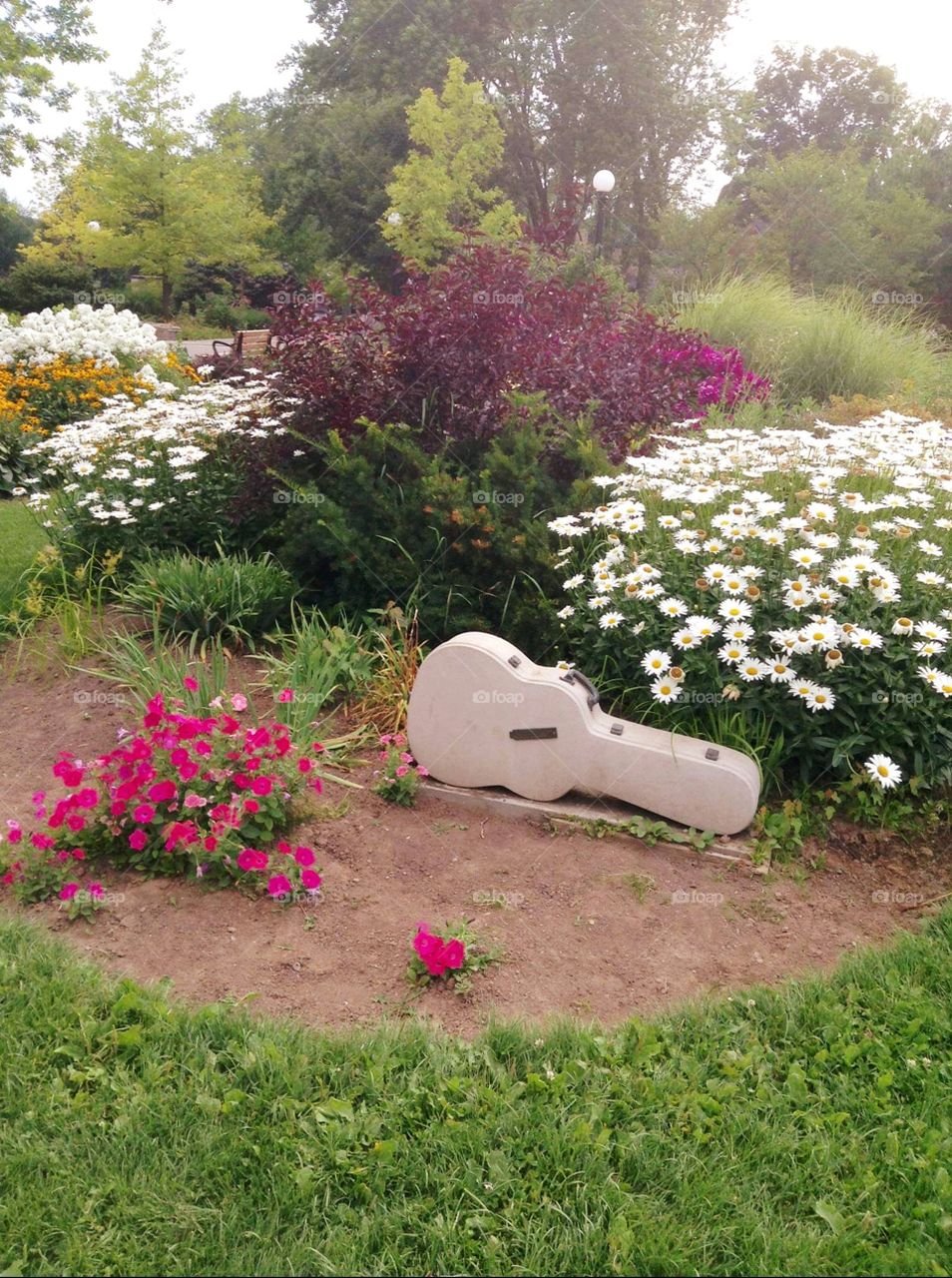 Guitar sculpture in garden