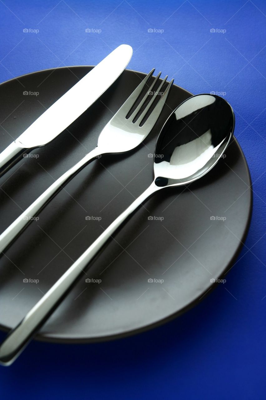 spoon, fork, knife and plate