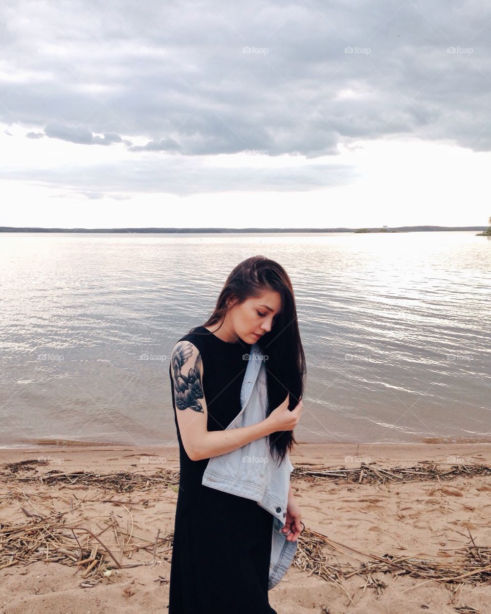 Tattooed brunette woman 