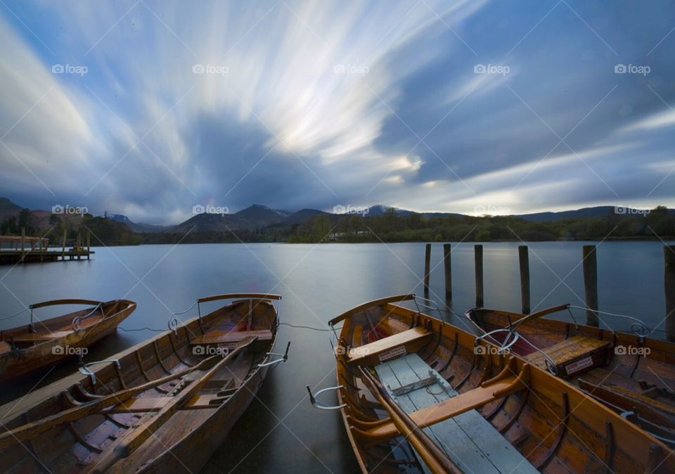 Boats at dusk. End of the day at Derwent Water, Lake District