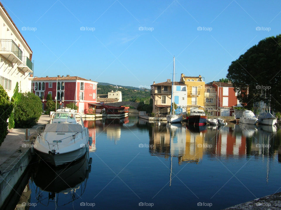 boats buildings houses reflection by jeanello