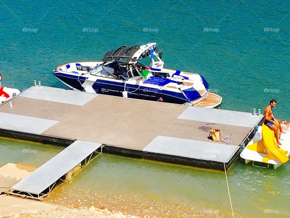 Boat, lagoon and tan 