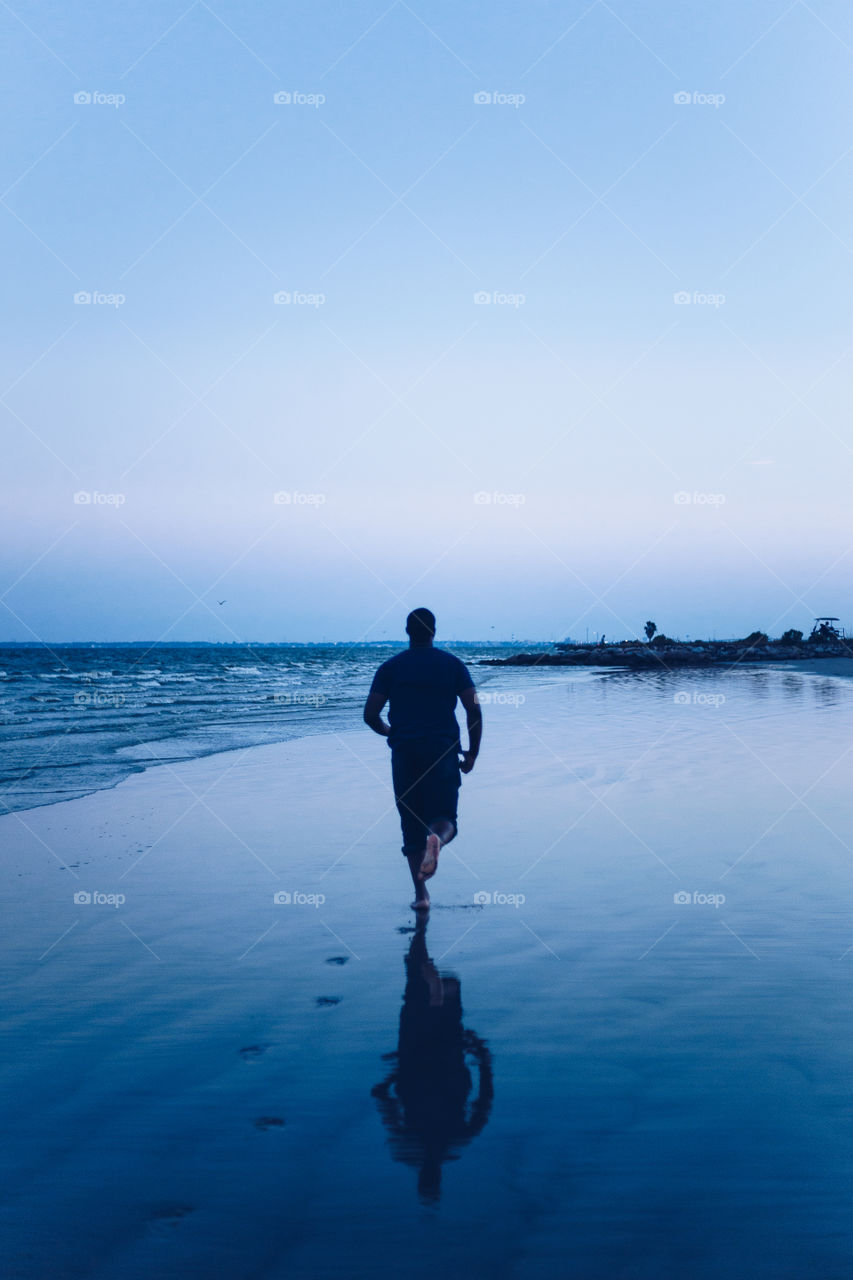 Beach run .. photographed my partner running on the beach 