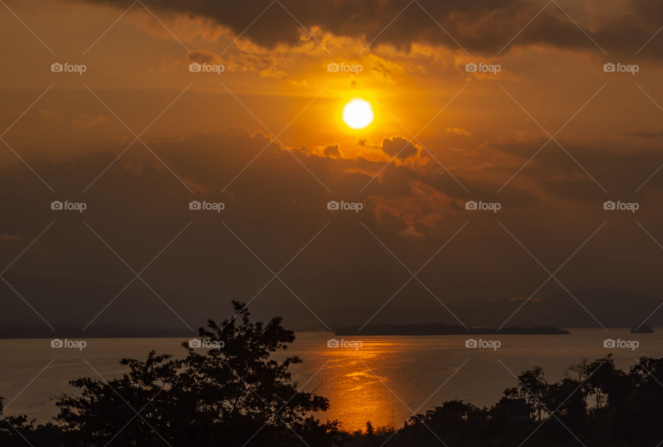 sunrise over Si Nakharin dam at Huay Mae khamin waterfall Nation