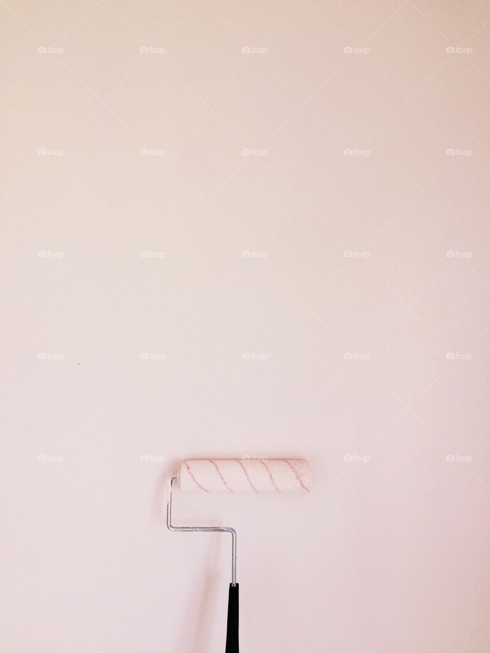Pink paint. Blank canvas of walls. 