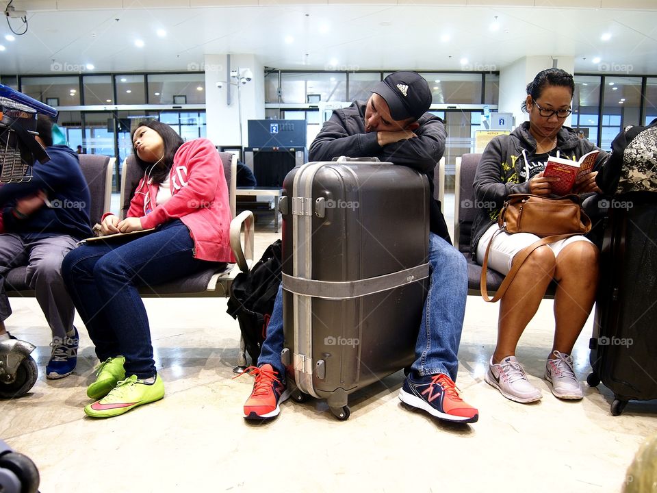 passengers of an airline waiting at the airport