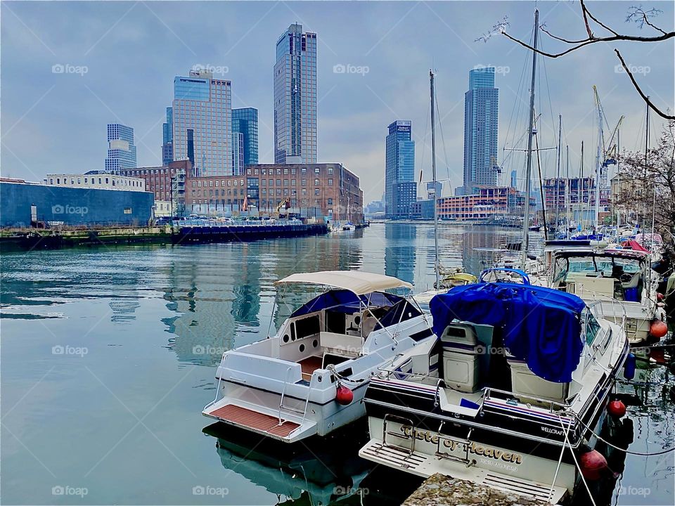“Newtown Creek” in LIC, Queens, NY by the “Pulaski Bridge” on a slightly overcast afternoon in February of 2023: It is rare to see the ocean so shiny, reflective and clear as it is today. Hypnotic Productions