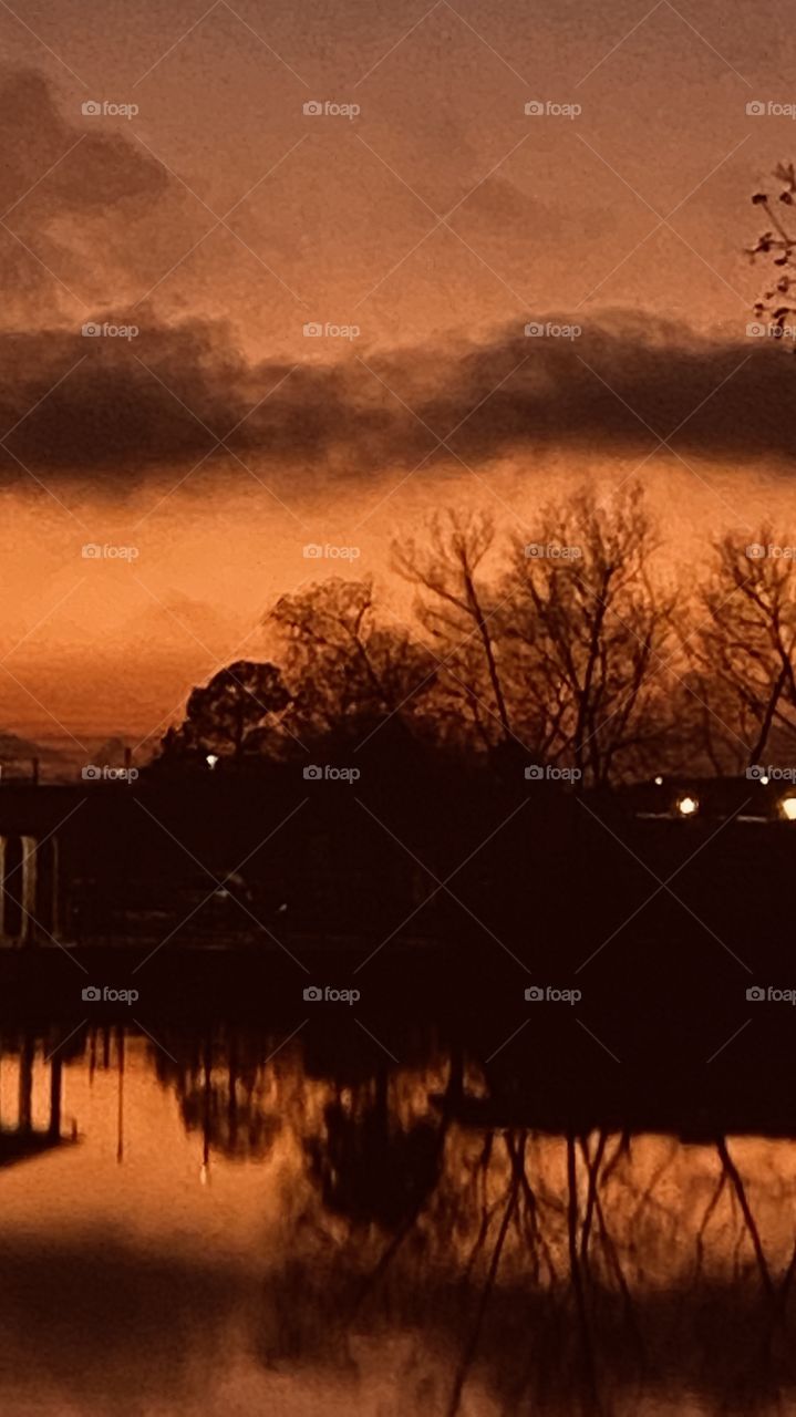 Took a Long Time for this pic due the Sky was so dark with above Clouds hanging Lower Than normal the Twilight took care of the Light and made a Spectacular Color and brought in down yo Night.