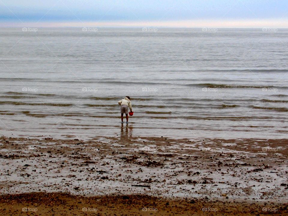 Child playing on the beach 2