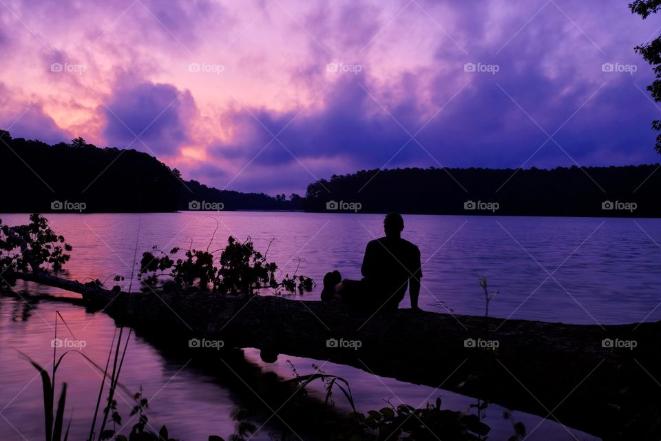 I only had a 10 second delay, so I had to reach down deep to find a combination of coordination and grace to get into this peaceful position without plunging into the lake... Lake Johnson in Raleigh North Carolina. 
