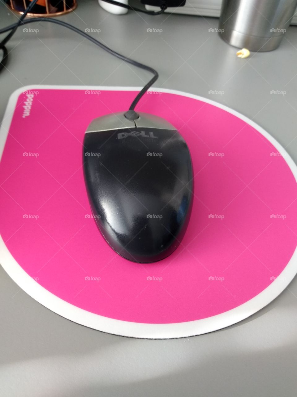 USB mouse on pink mousepad
