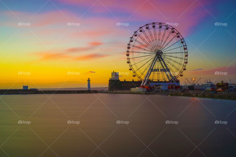 Sunset over the Ferris  wheel.  New Brighton
