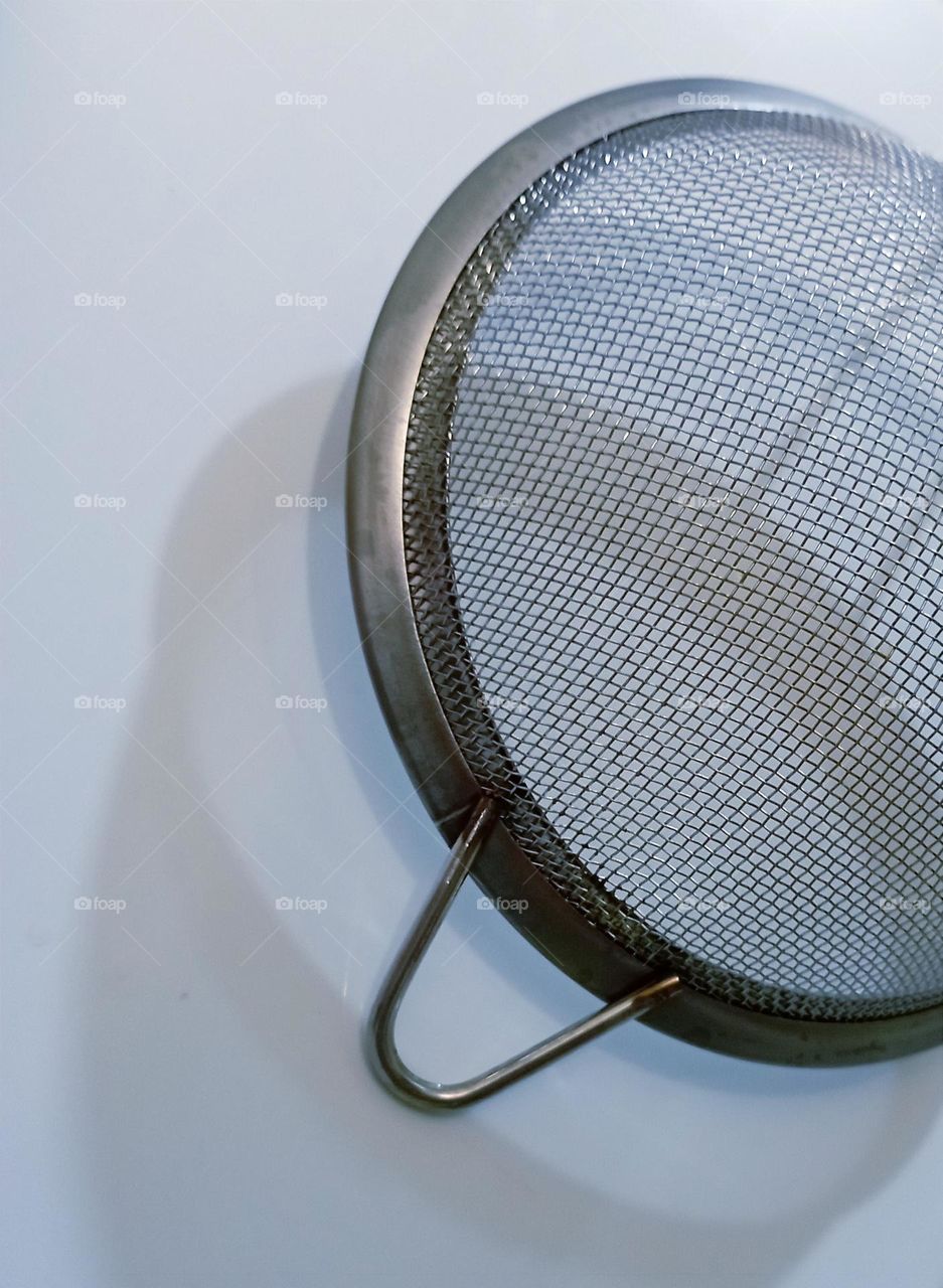 Steel filter hanging on the wall...