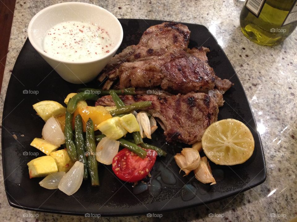 Lamb chops and vegetables and tztatziki 
