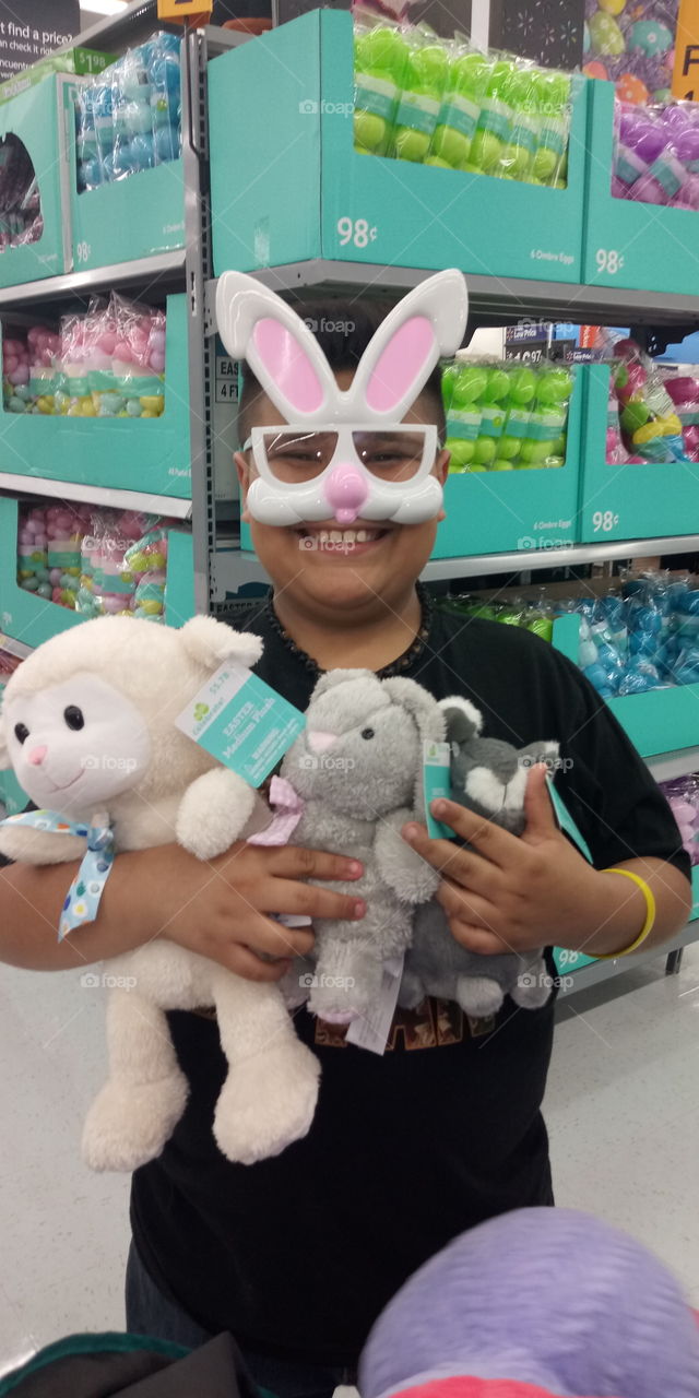 my son buying easter bunnys