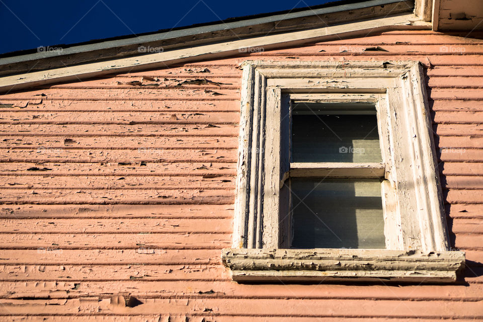 Low angle view of rusty house