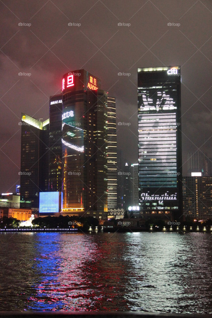 Skyscraper commercials at night at the bund Shanghai China