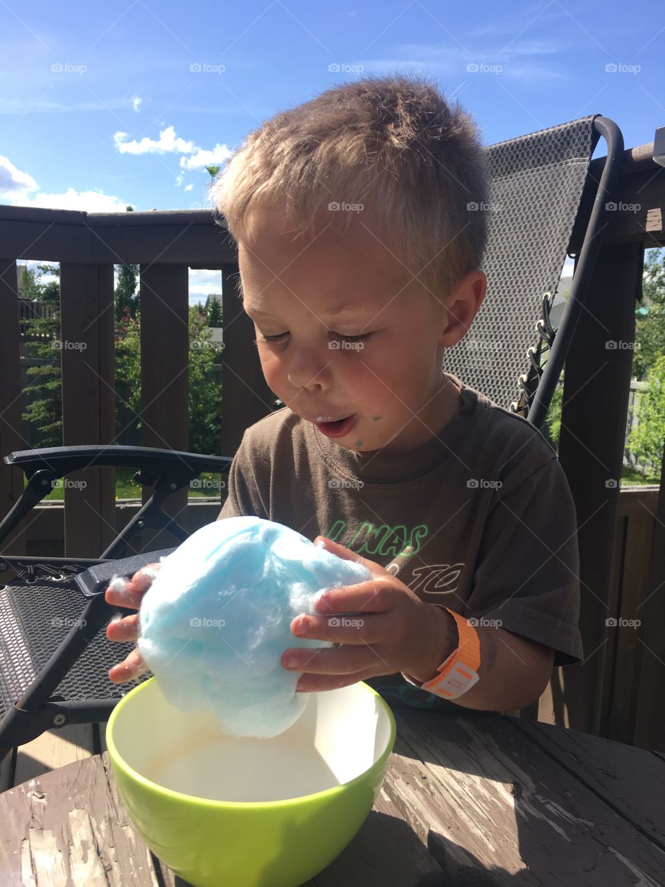 Eating cotton candy from the fair 