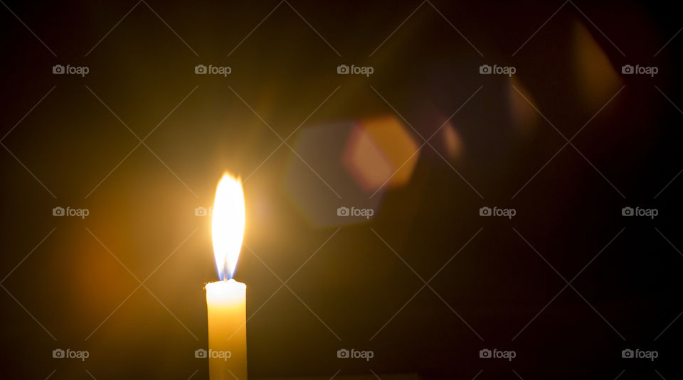 Close-up of single candle