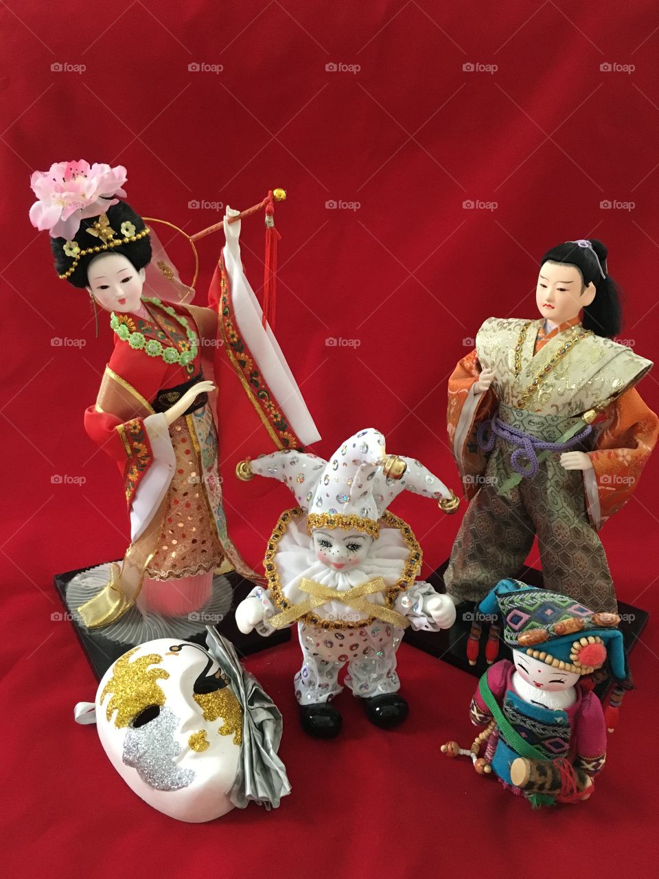 dolls: a geisha, a samurai, a joker, a Japanese girl. mask. theater.