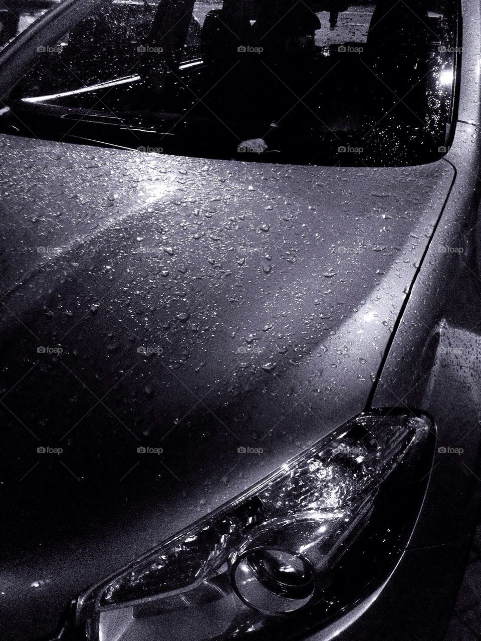 Raindrops on car after rain