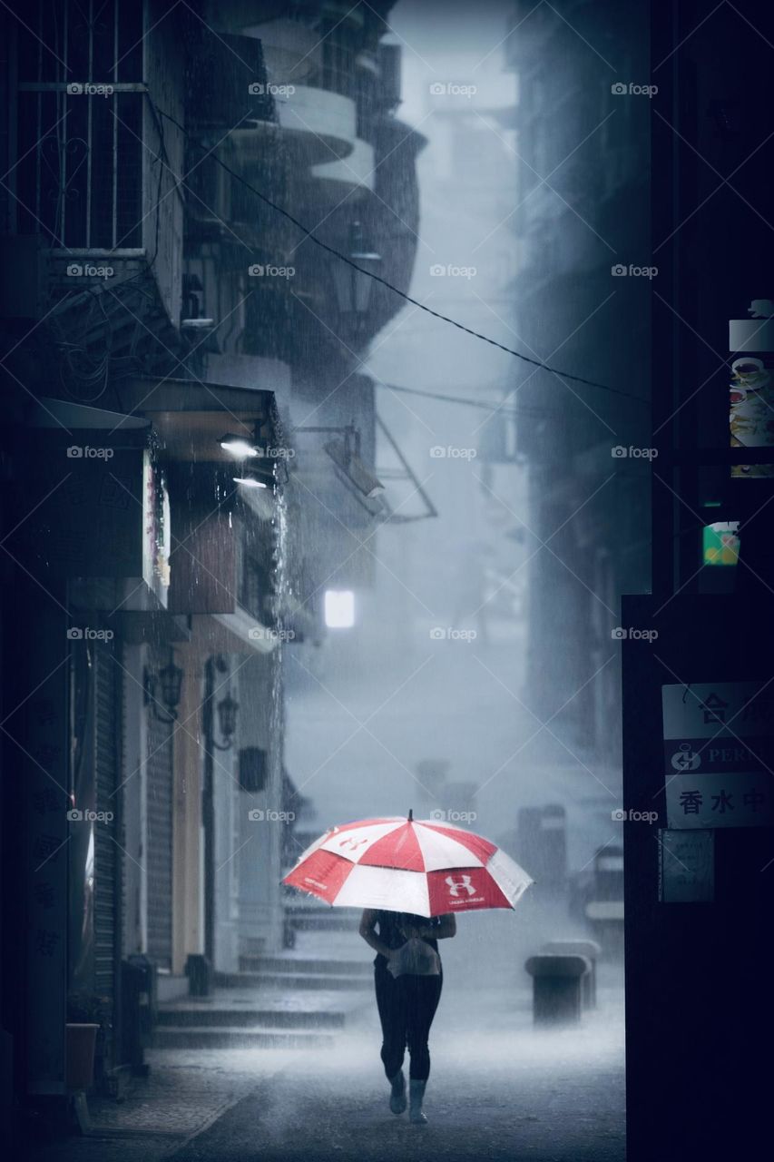 Rainy day with a red umbrella