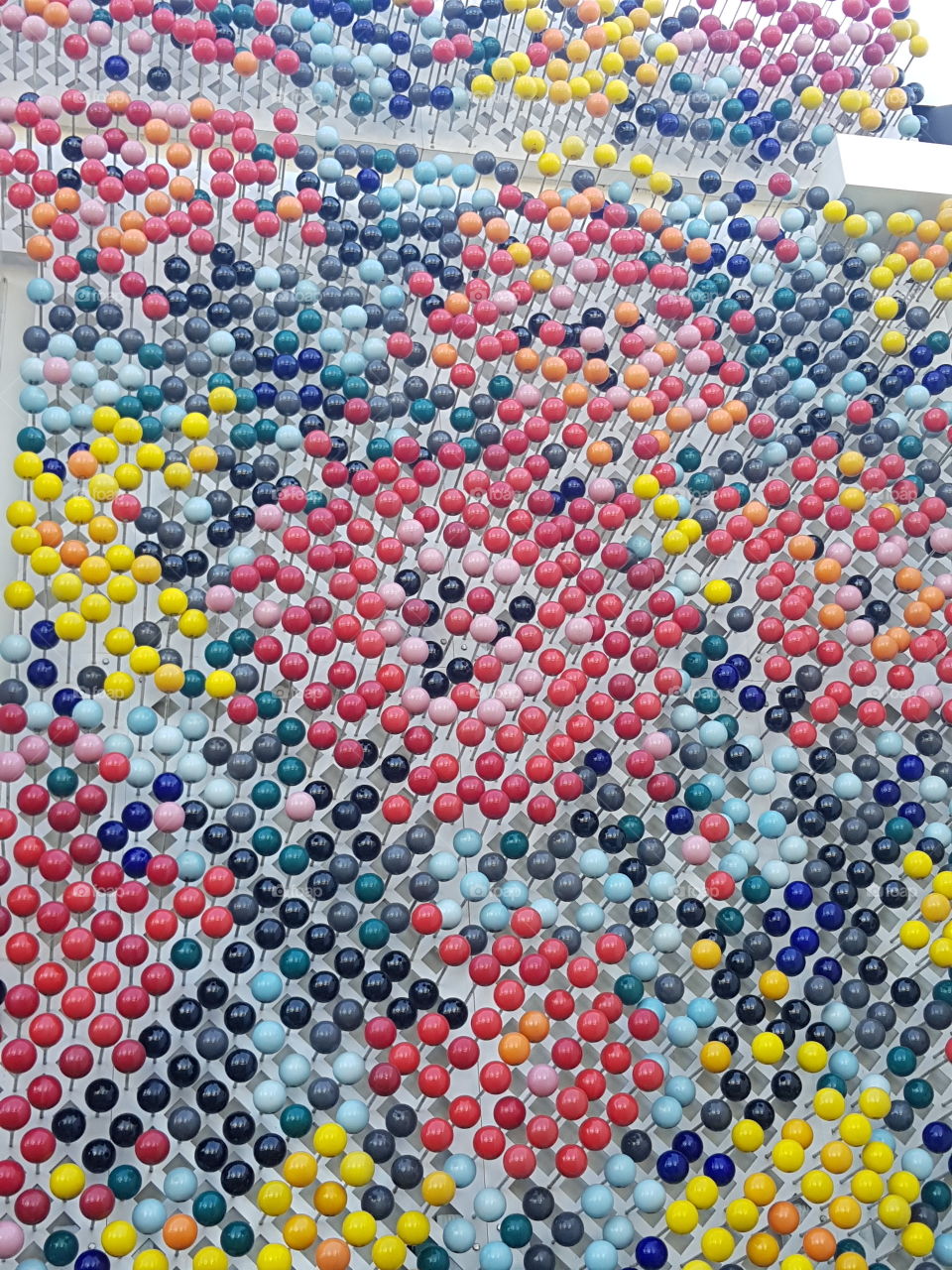 The colorful bulbs that grace the wall of this building in Napier City. It's a sight that stops us in our tracks and we stare.