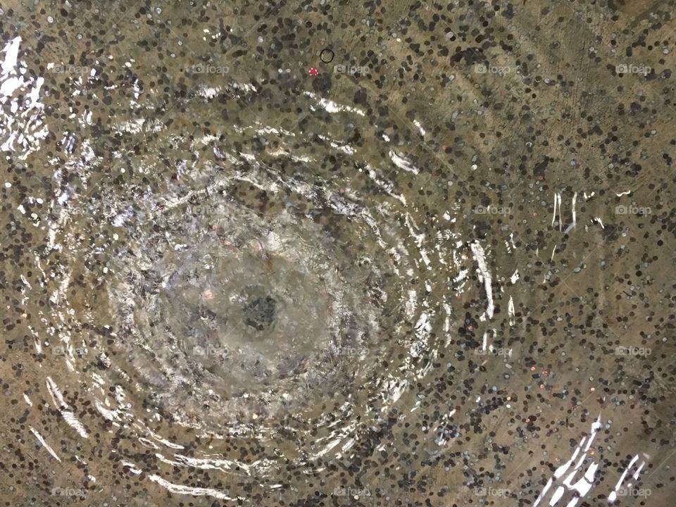 Moving water near fountain drain