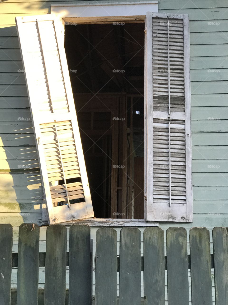 Broken shutters and home