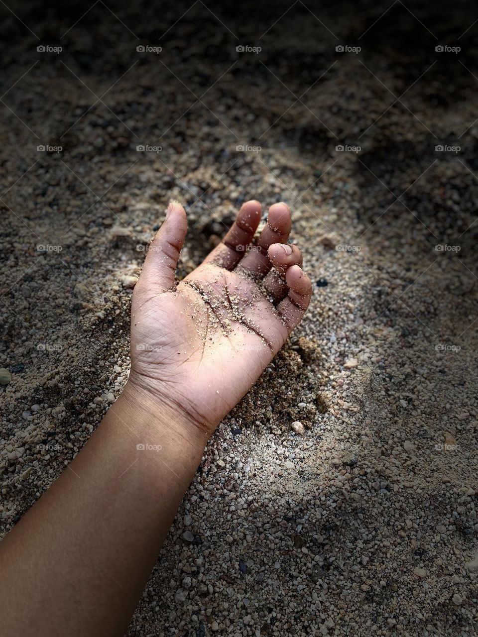 When we visited our village, my sister's first outing was playing with soil and water