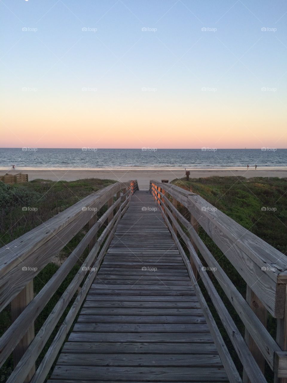 Long boardwalk. Boardwalk to the beach