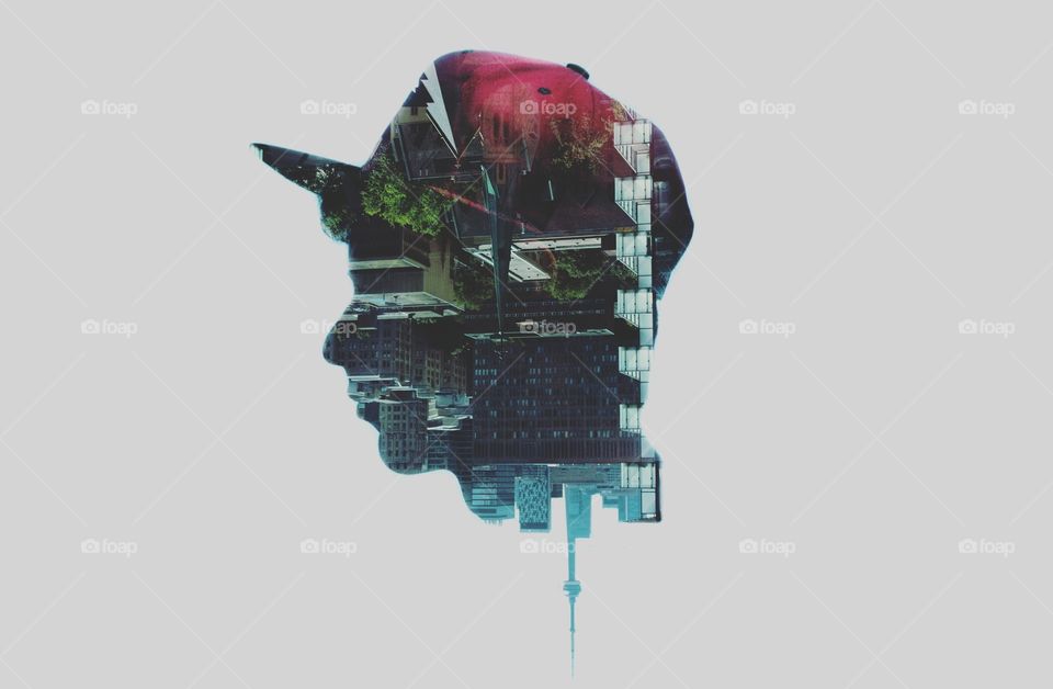 An amazing double exposure of a profile and a city