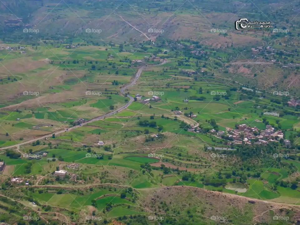 Glory be to God, the magnificent and picturesque view and the natural green trees are a view that is nothing more wonderful than it