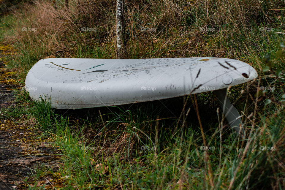 windsurfing board waiting for the waves in the field.