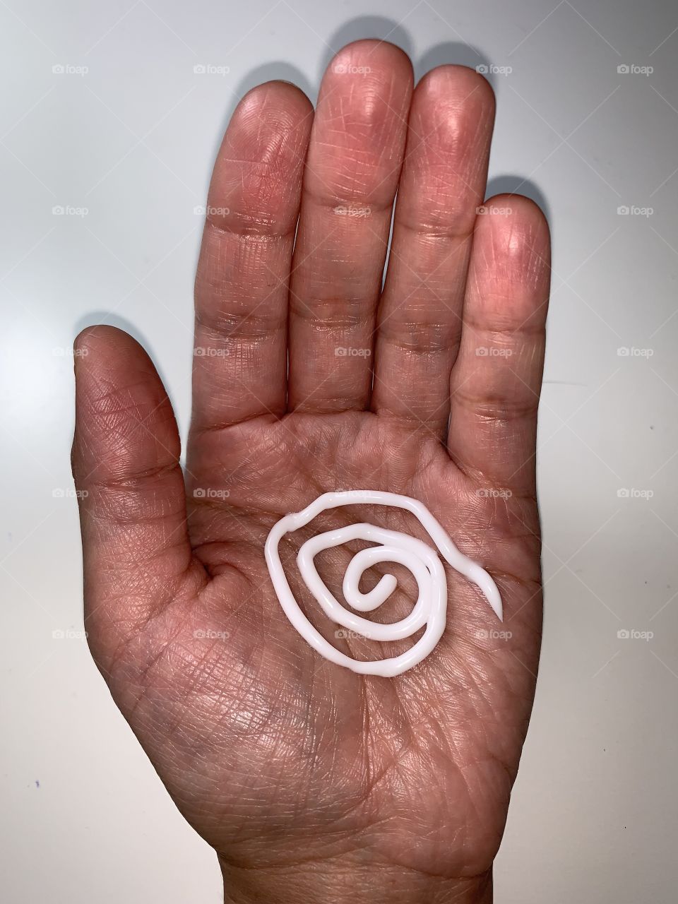 Moisturizing cream and lotion on my hand