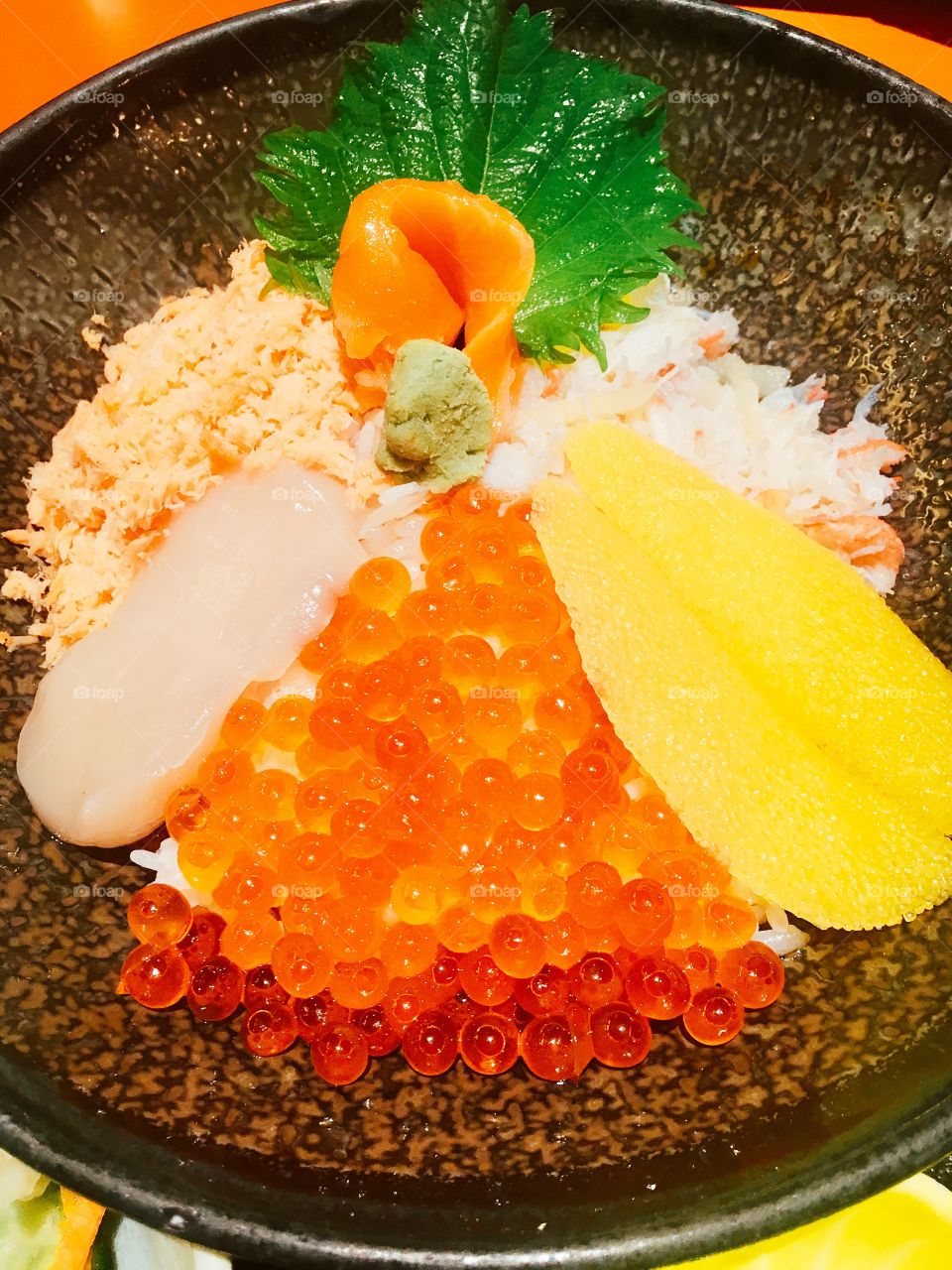 Fresh Salmon egg, shell  and king crab sushi japanese food