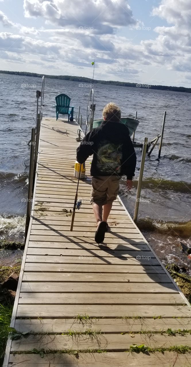 Boy Intent on Fishing