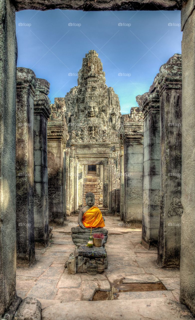 Serene Buddha at the entrance of bayon temple, Angkor wat, siem reap