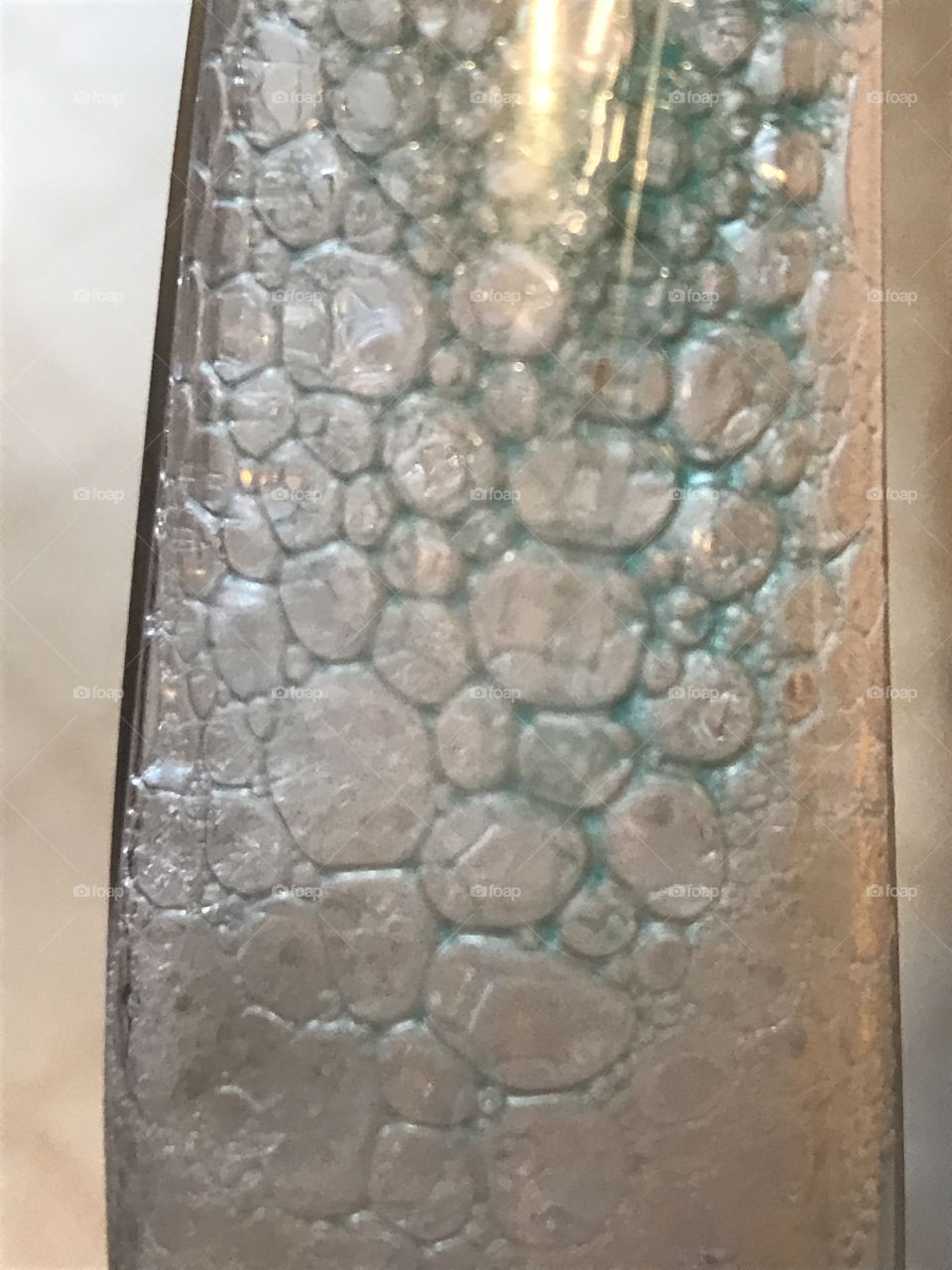 Soap bubbles in sponge handle 