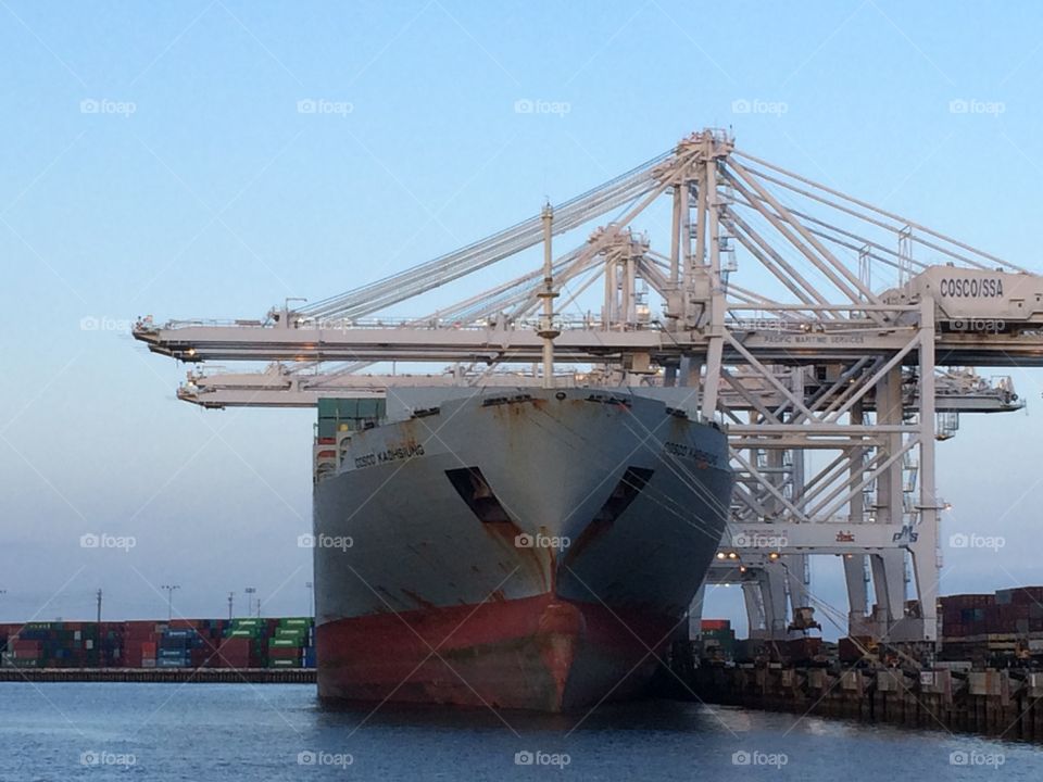 Port of Long Beach cargo ship and cranes 