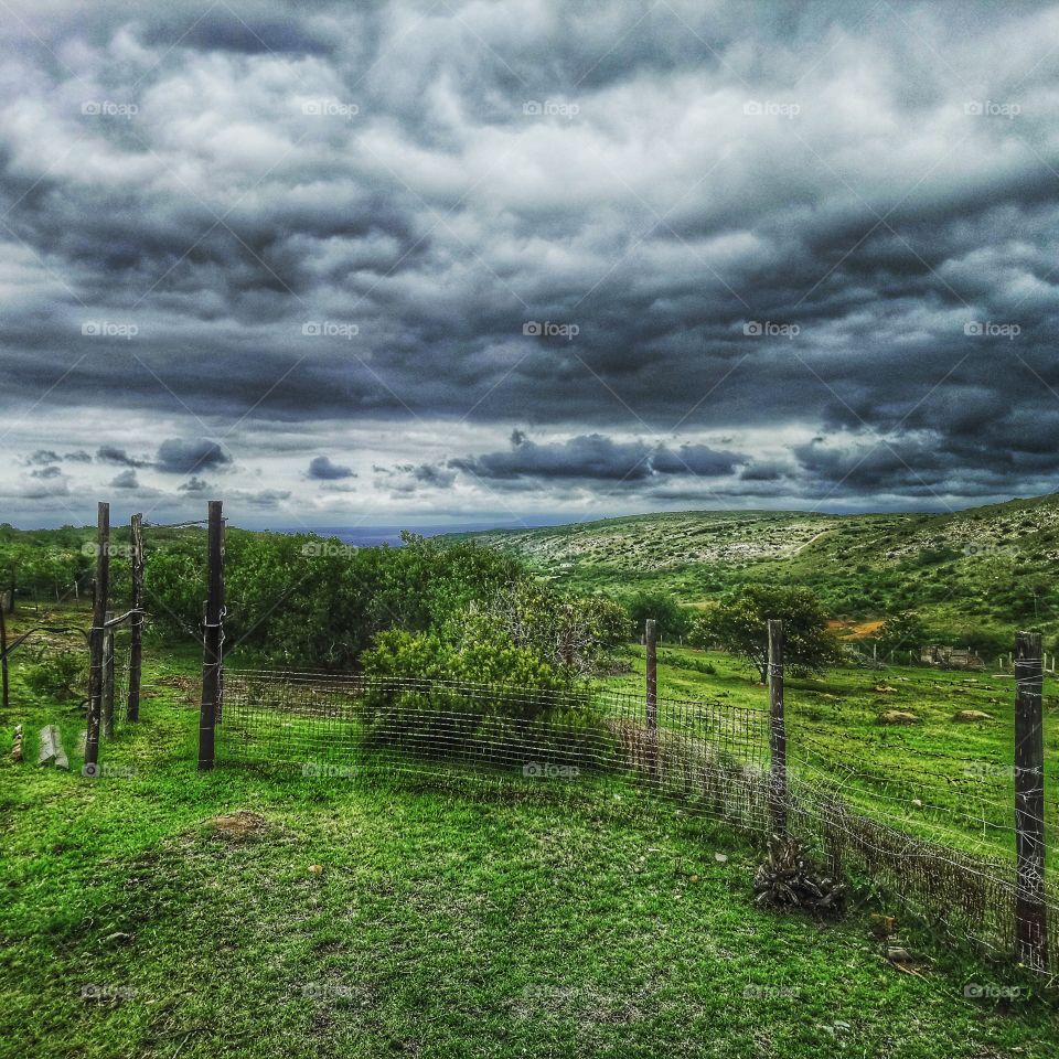 Farm landscape with stormy sky