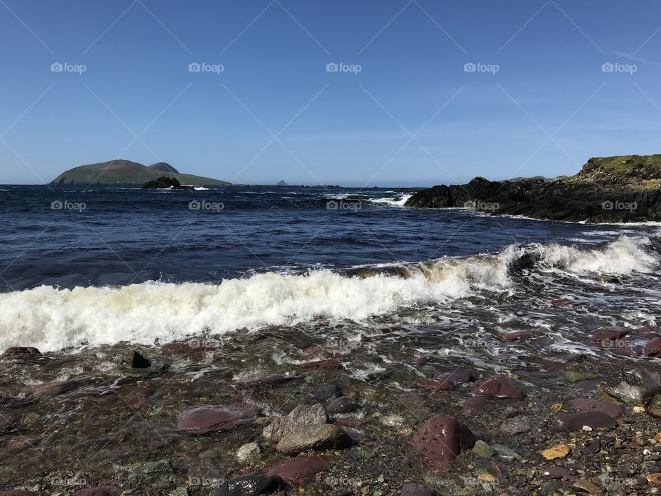 Waves crashing over a rocky shore