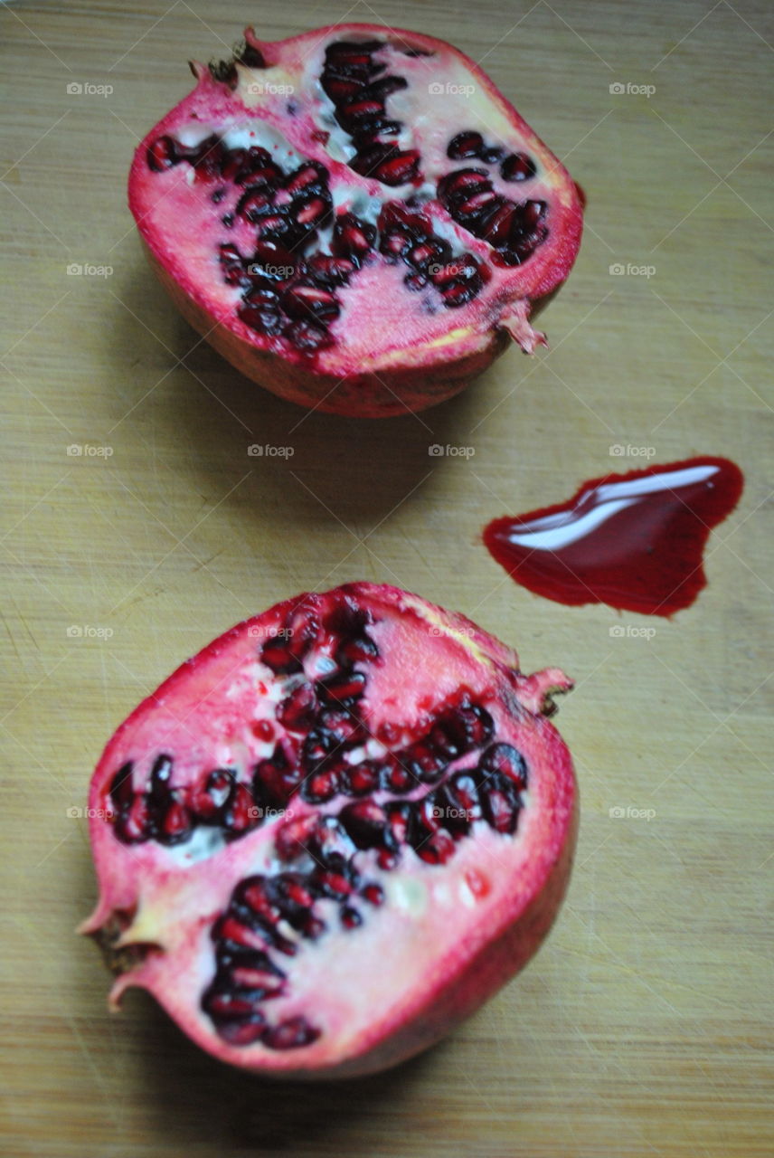 A pomegranate cut in half