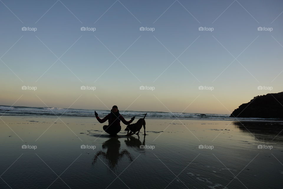 Sunrise#beach#ocean#human#dog#moment