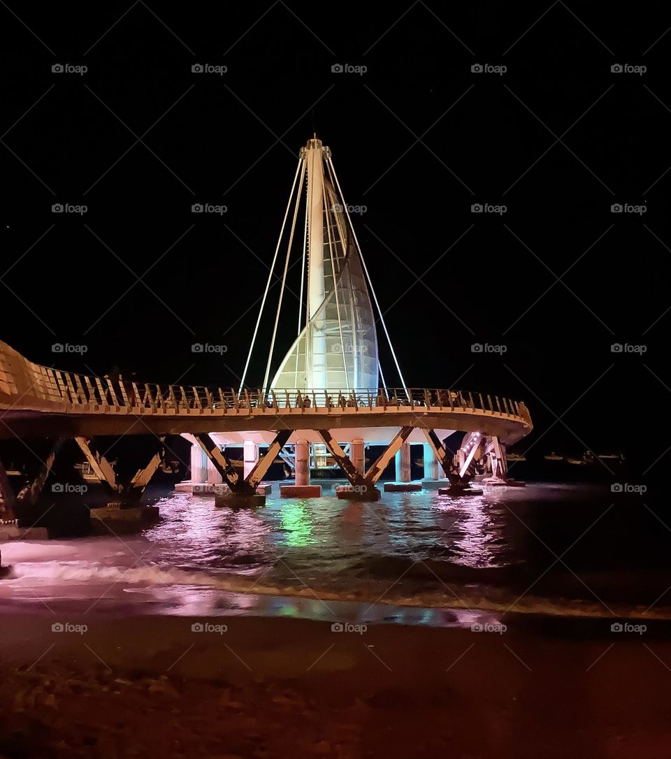 The sail like structure on the pier at Playa Los Muertos.