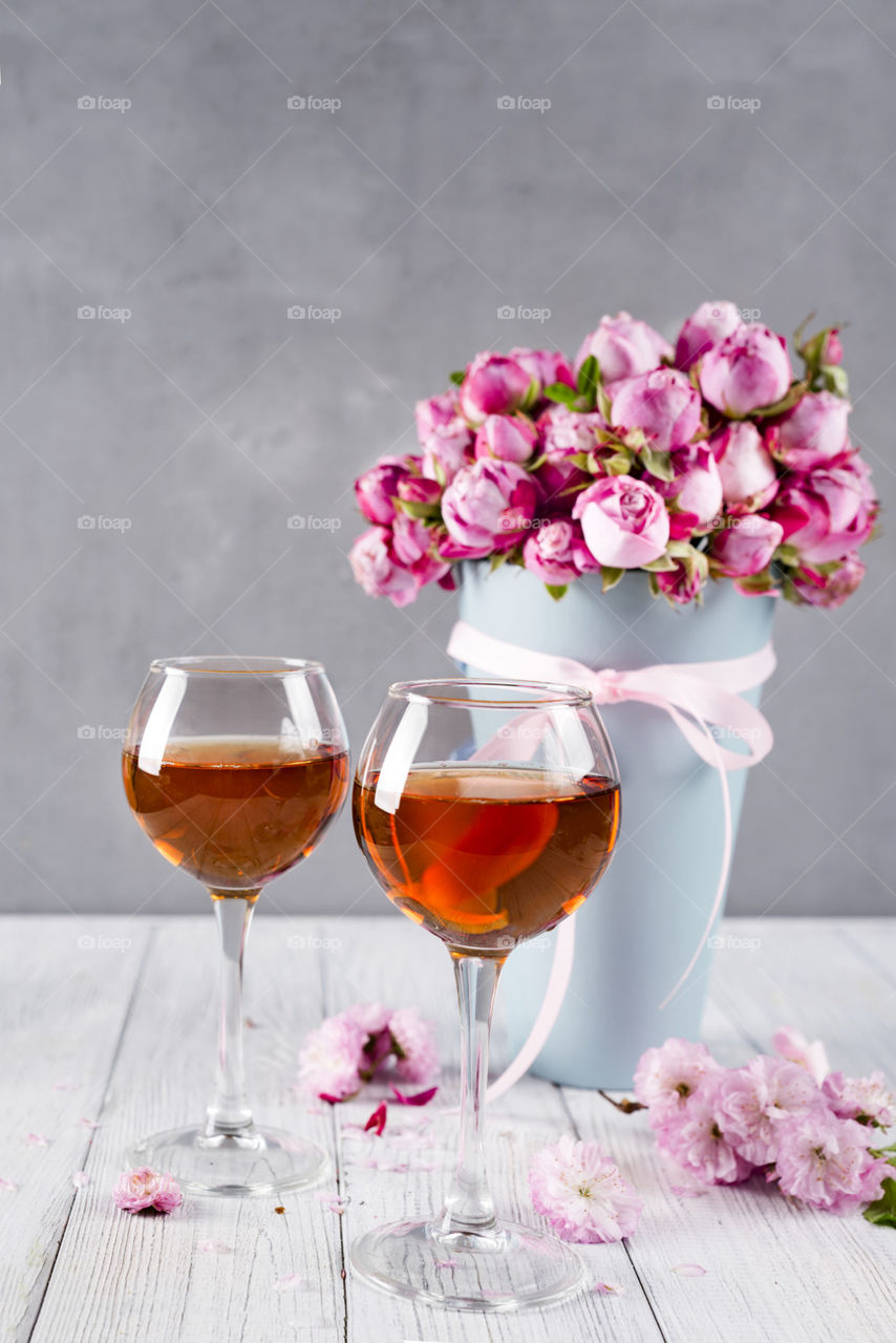 wine glass with rose bouquet