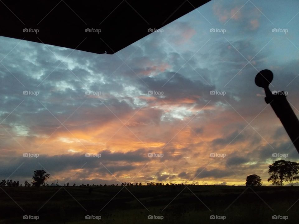 a beautiful sunrise captured from a tractor